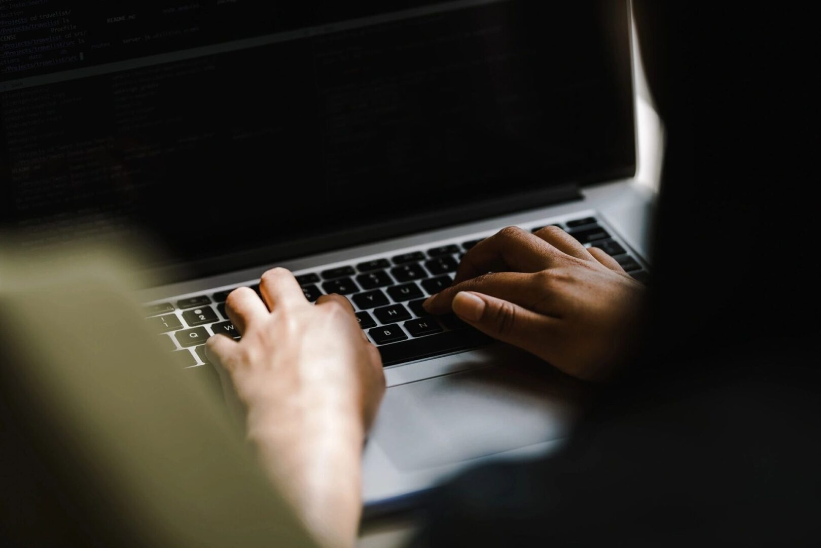 person typing on computer